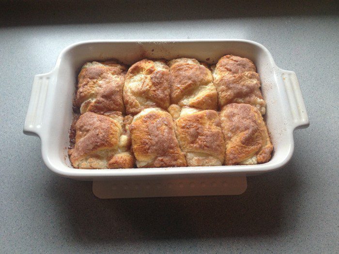 A white baking dish with Easy Cheesecake Rollups in it.