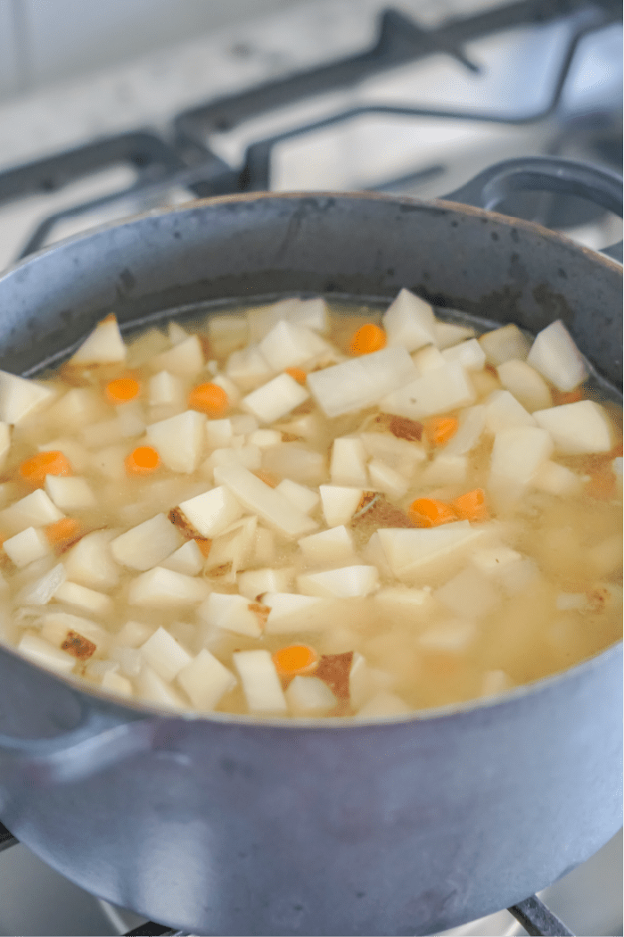 A pot of potato and carrot soup.