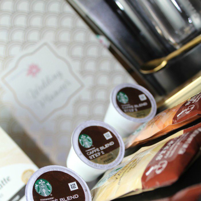 Starbucks k-cups on a wedding planning table.