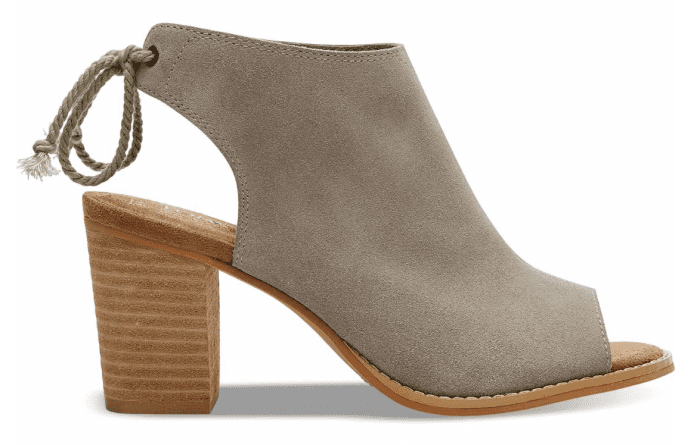 A women's grey suede peep-toe bootie with a wooden heel for summer.