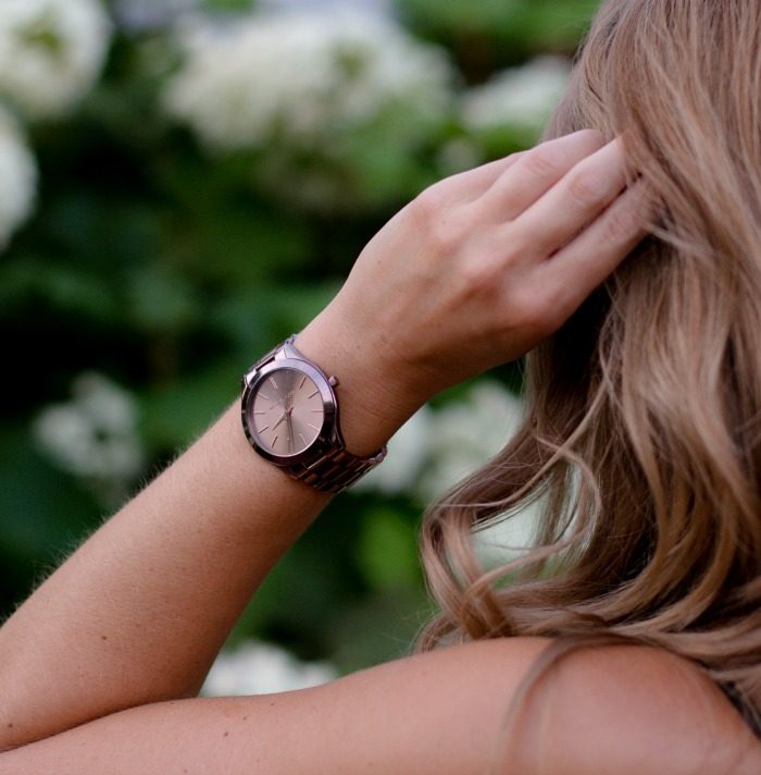 A woman's wrist with a Valentine's Day gift watch on it.