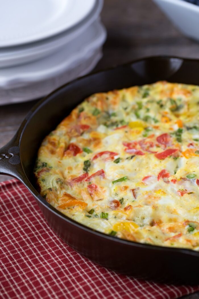 A skillet filled with an egg and vegetables, perfect for Easy Christmas Morning Breakfast Recipes.