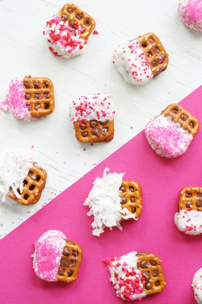 Easy Valentine's Day dessert pretzels on a pink background.