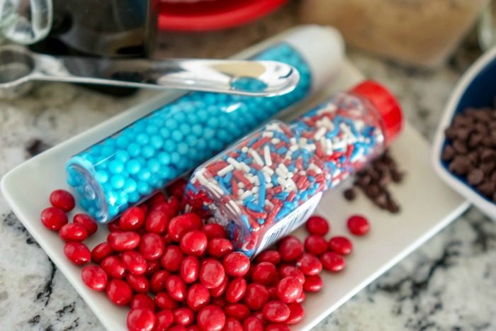 Red, white and blue sprinkles on a white plate for the 4th of July.