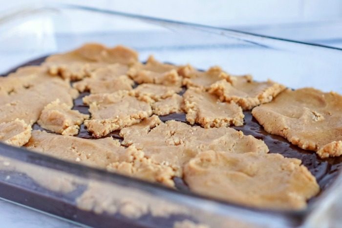 A baking dish filled with easy pumpkin peanut butter brownies.