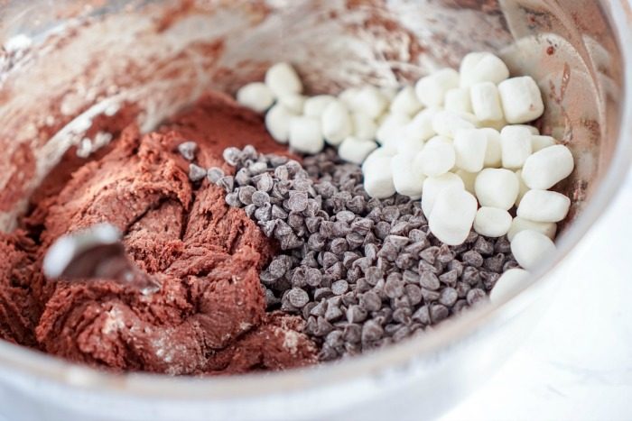 Easy Hot Chocolate Cocoa Cookies Recipe: Marshmallows, chocolate chips, and marshmallows in a mixing bowl.