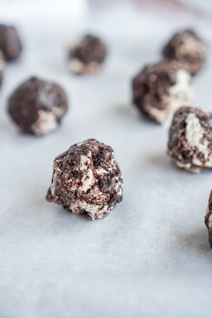 No Bake Oreo Cheesecake Balls on a baking sheet.