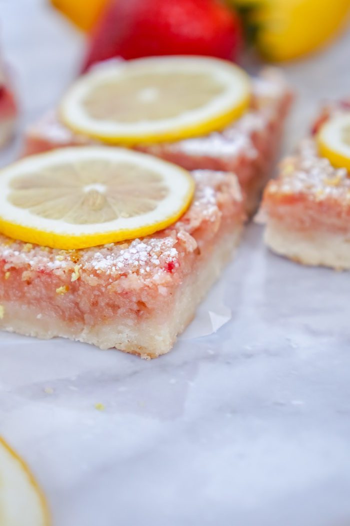 Strawberry Lemon Bars Recipe with powdered sugar.