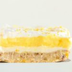 Lemon-Lush-Dessert-slice-on-a-spatula