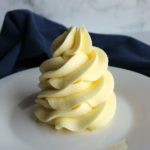 close ruffled pile of lemon sweetened condensed milk frosting