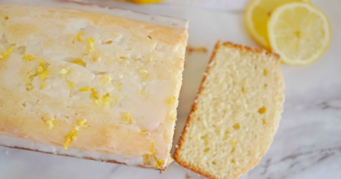 Lemon Pound Cake Recipe with cut pieces of cake on a marble plate