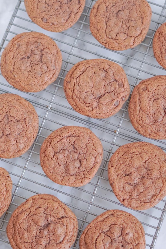 A wire rack with chocolate cookies.