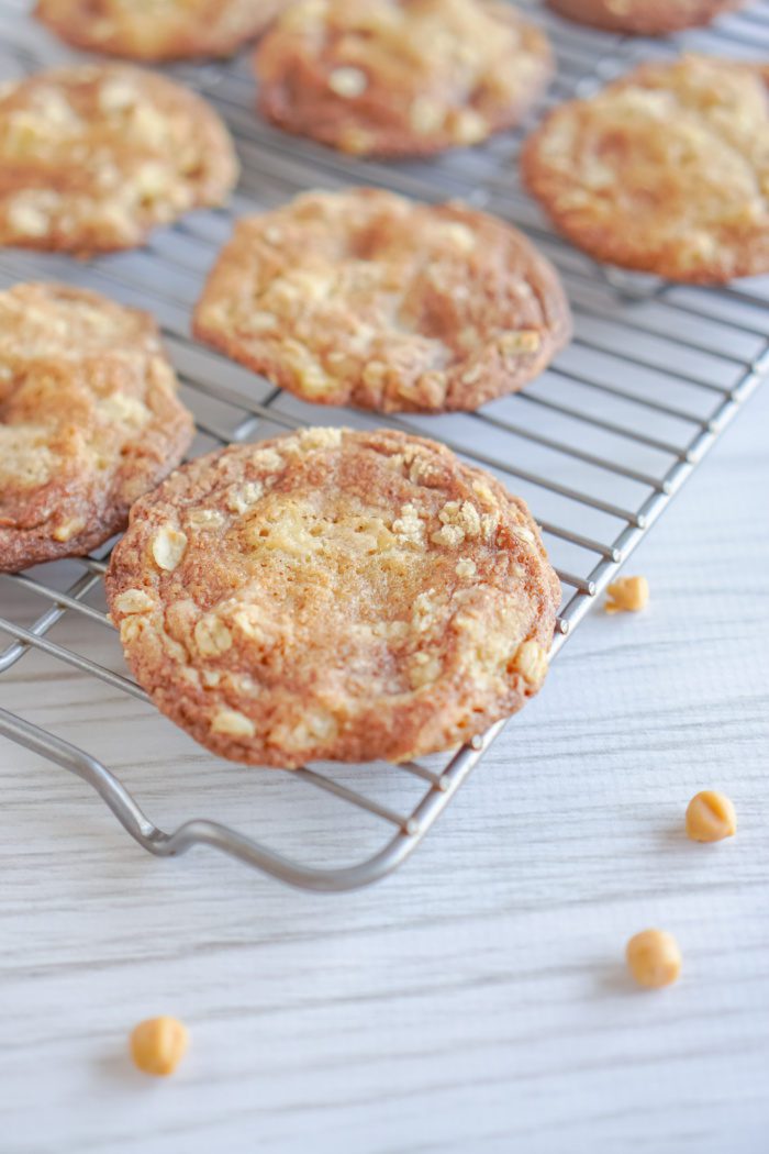 Oatmeal butterscotch cookies on a cooling rack.