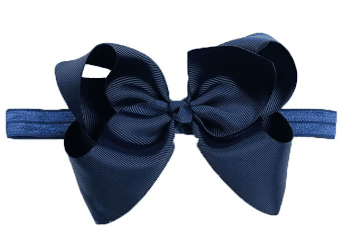 A navy blue bow on a headband.