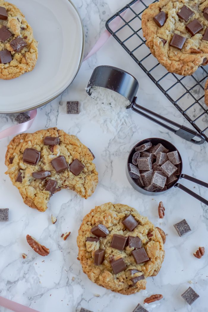 A close-up of chocolate chip cookies on a table.