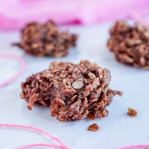 A close-up image of a pile of chocolate no-bake cookies.