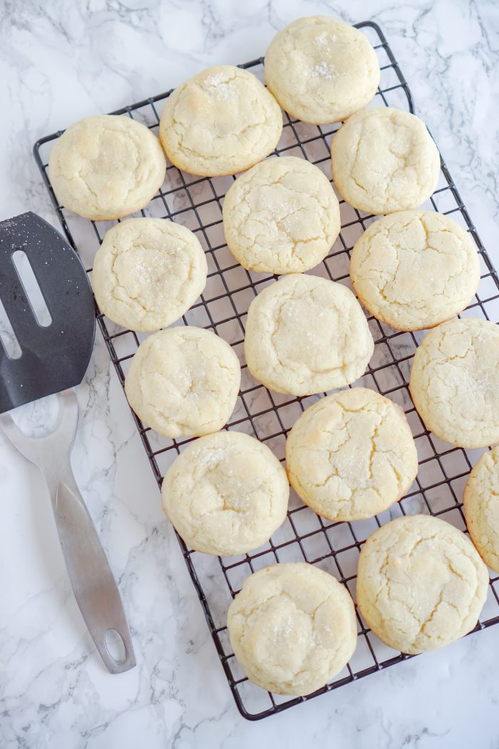 A cooling rack of soft sugar cookies.