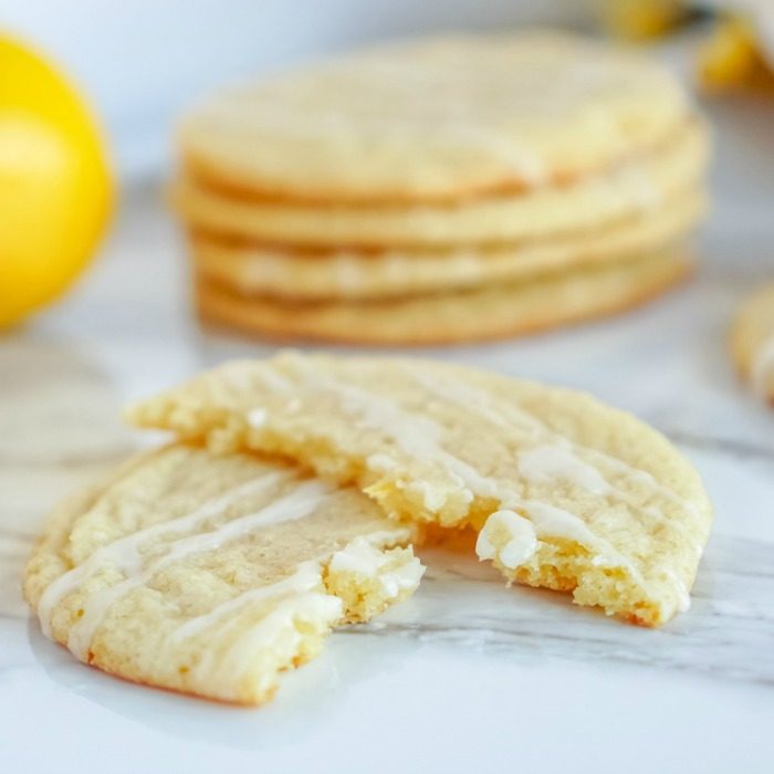 A lemon cookie broken in half.