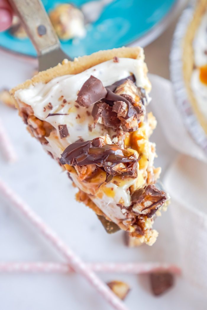 A slice of no-bake Snickers pie.