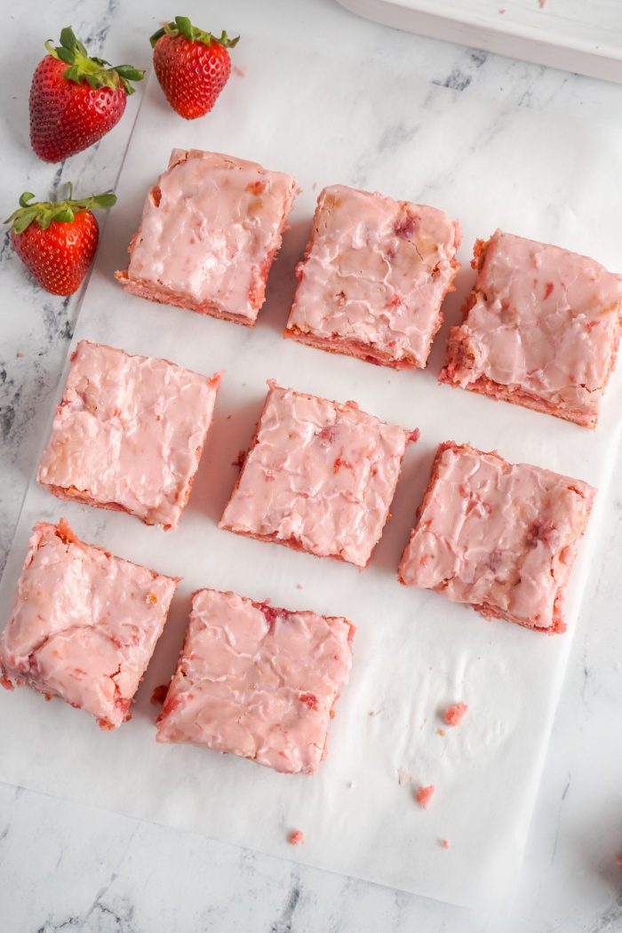 Homemade strawberry blondies with glaze.