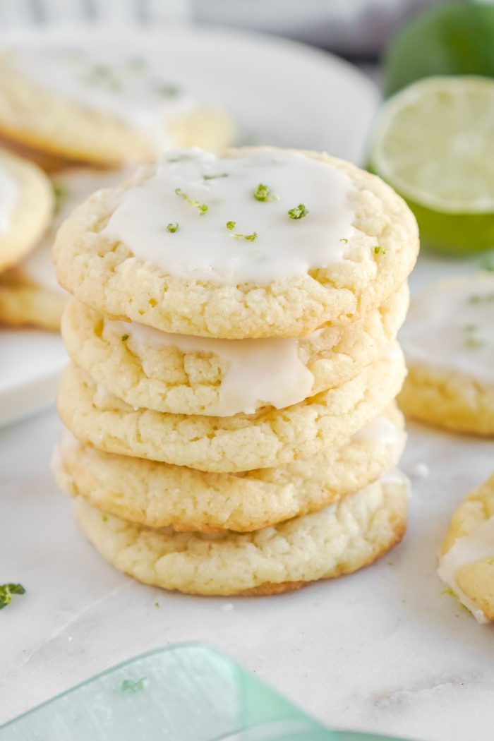 A stack of four lime sugar cookies.