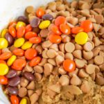 Close up bowl of reese’s pieces and peanut butter morsels