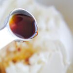 Vanilla being poured into bowl