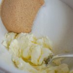 Butter and sugars in mixing bowl