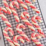 Candy cane cookies cooling on rack