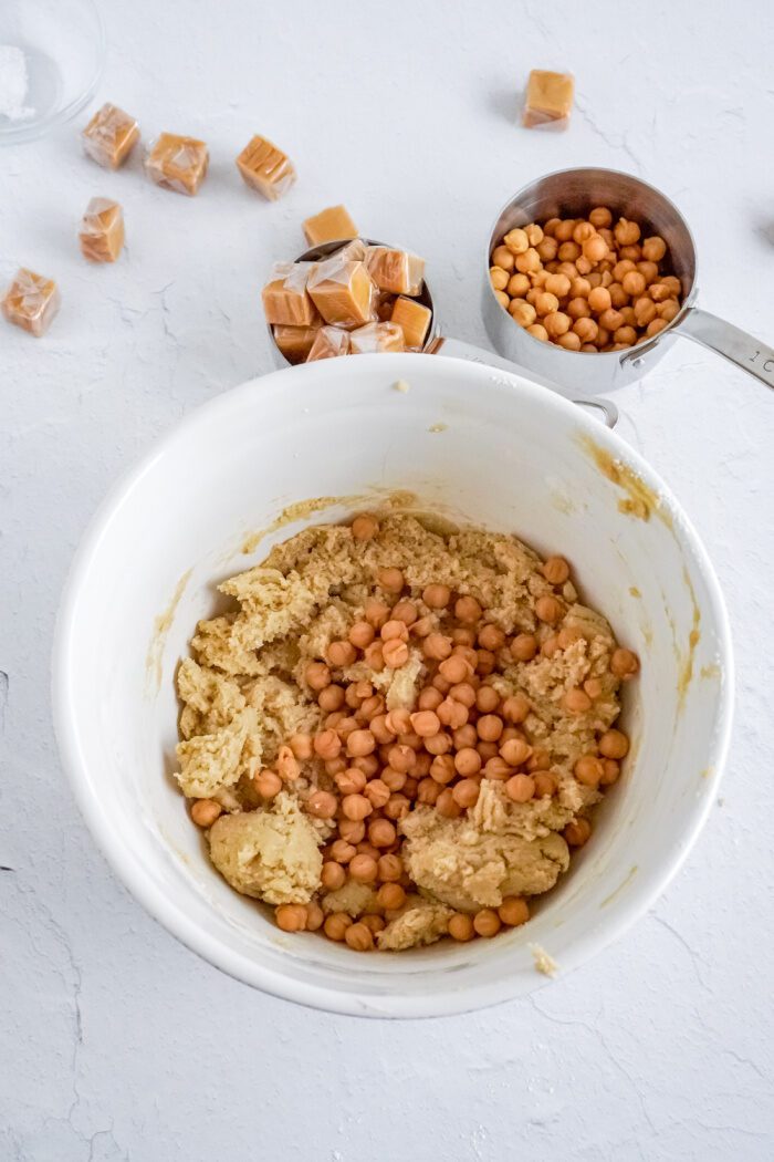 Caramel pieces added to the bowl