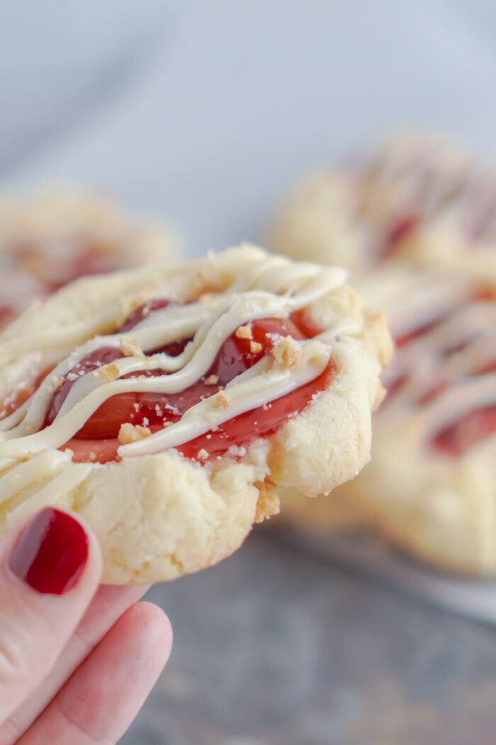 Someone Holding a Cheesecake Cookie