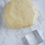 Chilled dough and a square cookie cutter