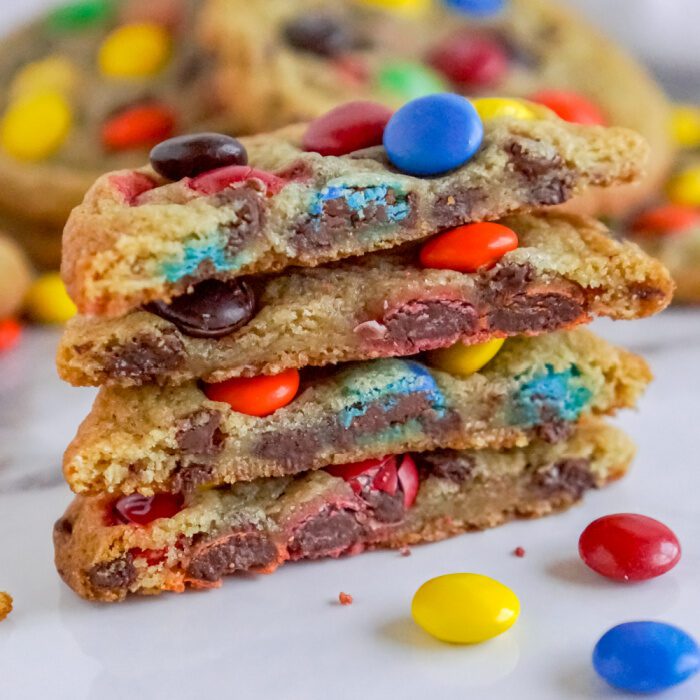 Close Up View of Sliced Stack of Chocolate Chip M&M Cookies