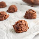 Cookie dough balls on baking sheet