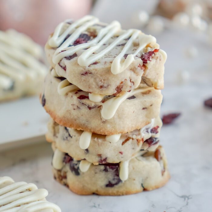 4 stacked cranberry shortbread cookies