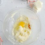 Egg and vanilla added to bowl