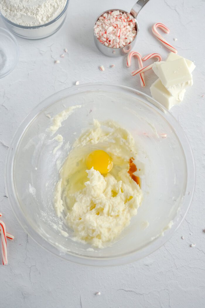 Egg and vanilla added to bowl