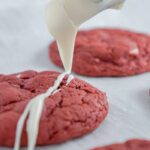 Icing being drizzled on cookie