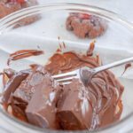 Melted almond bark in bowl