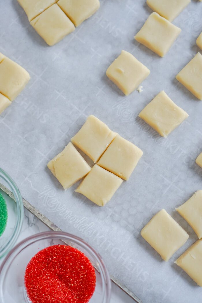 Mini cookies on baking sheet