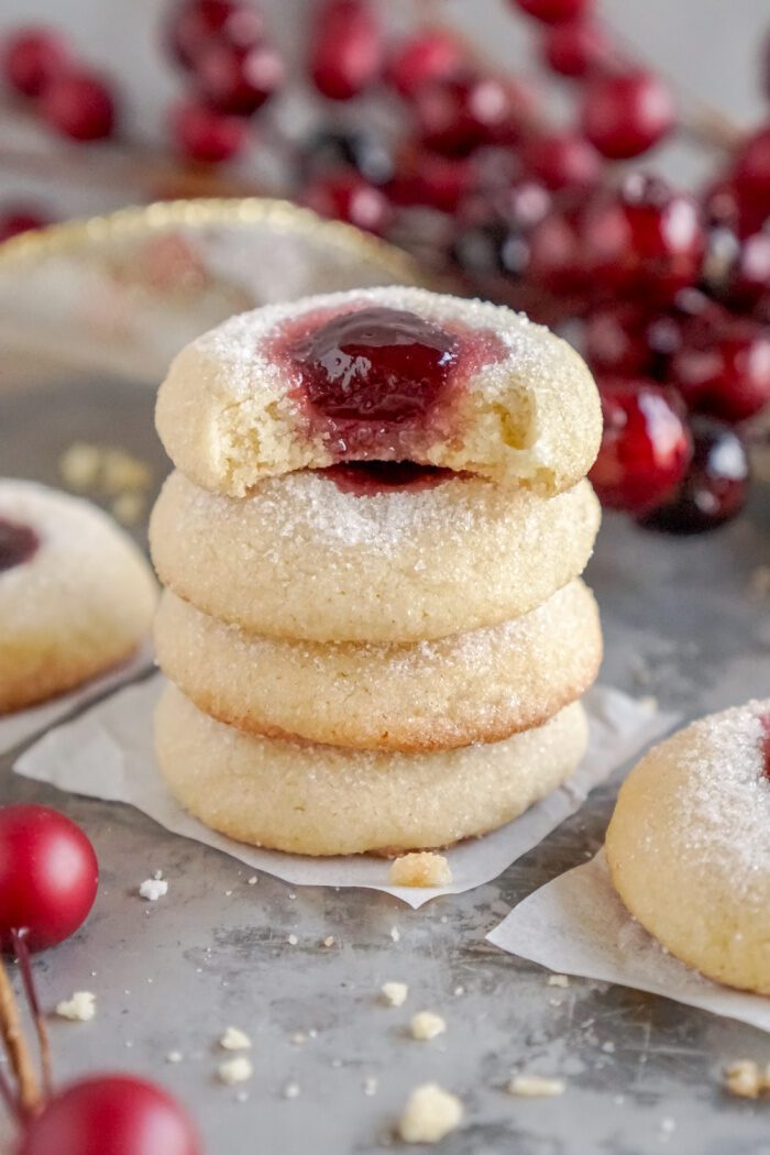 Stack of cookies with bite taken out of top cookie