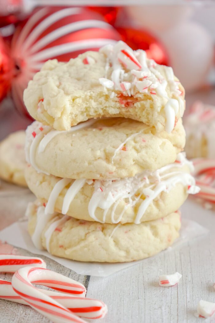 Stack of cookies with bite taken out of top cookie