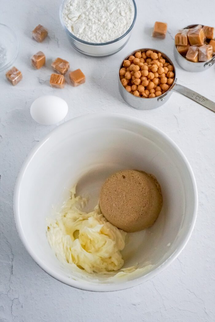 Soften butter and brown sugar in the bowl