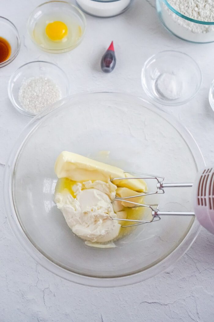 Softened butter and cream cheese in bowl