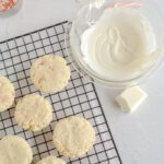 Undecorated baked cookies on cooling rack