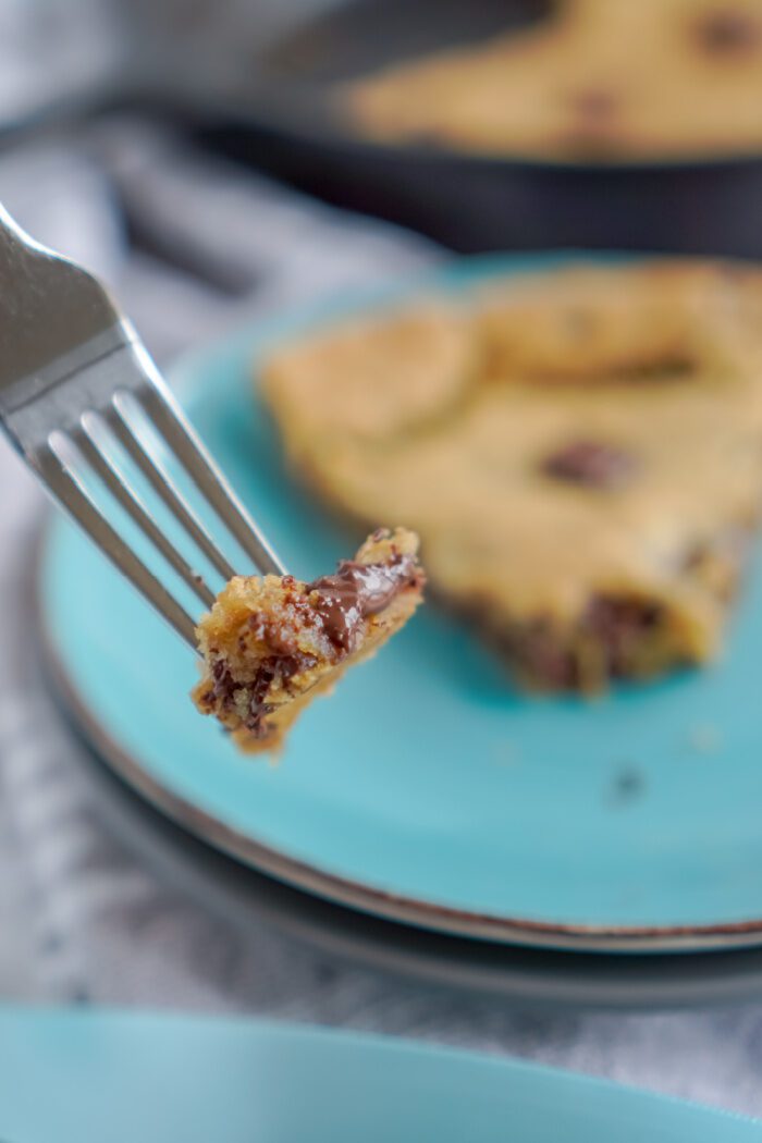 Piece of Chocolate Chip Skillet Cookie On a Fork