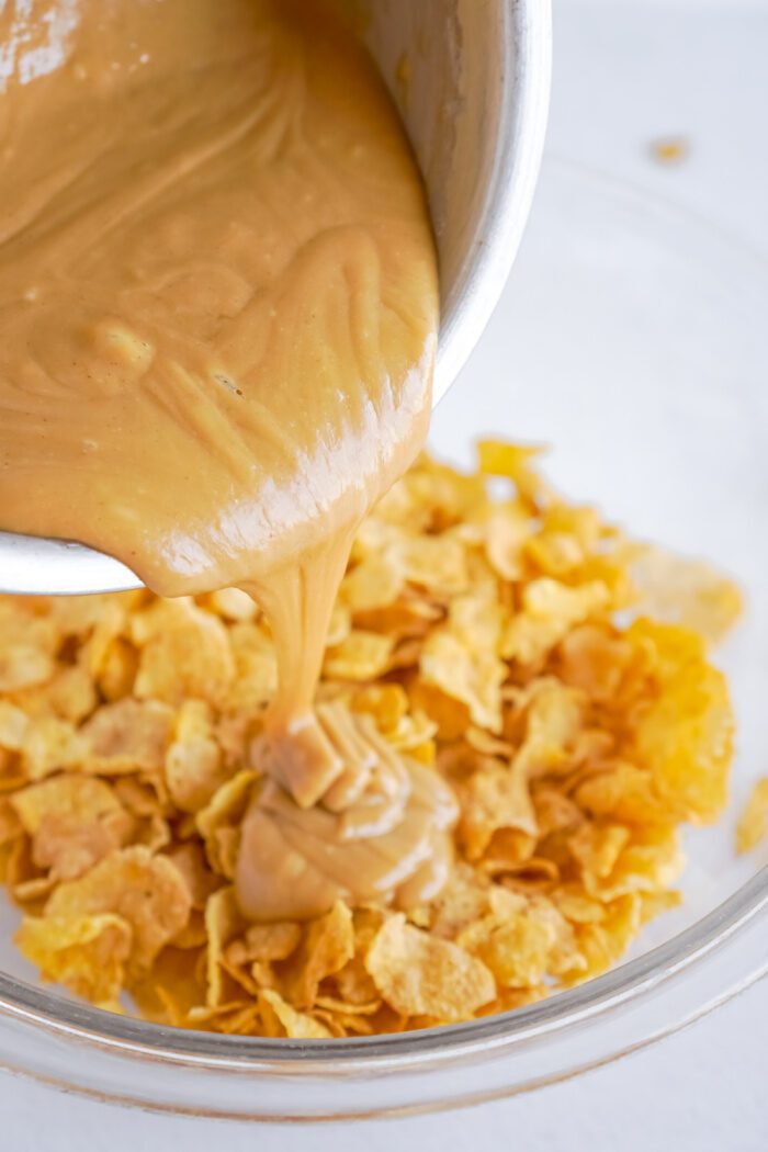 Melted Ingredients Being Poured Over Cornflakes