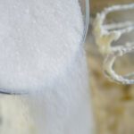 Sugar Being Added to Mixing Bowl