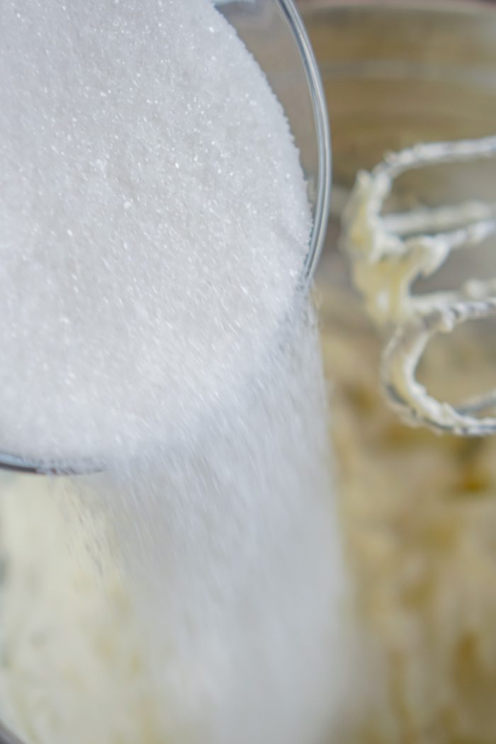 Sugar Being Added to Mixing Bowl