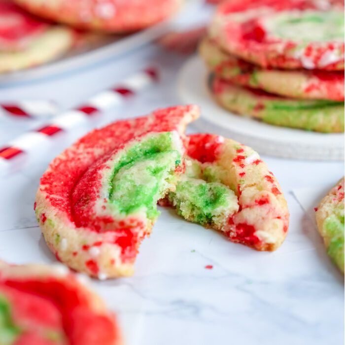 Close up of a Funfetti Christmas Sugar Cookie broken in half